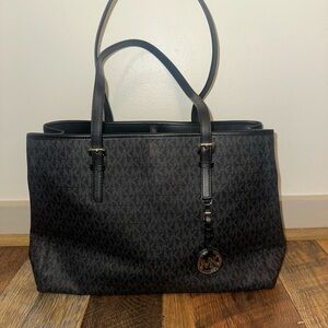 Michael Kors Black Tote Bag with Structured Shape and Monogram Pattern